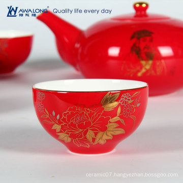 red color ceramic teapot with cup underneath Asian charactics kungfu tea house use teapot and cup set